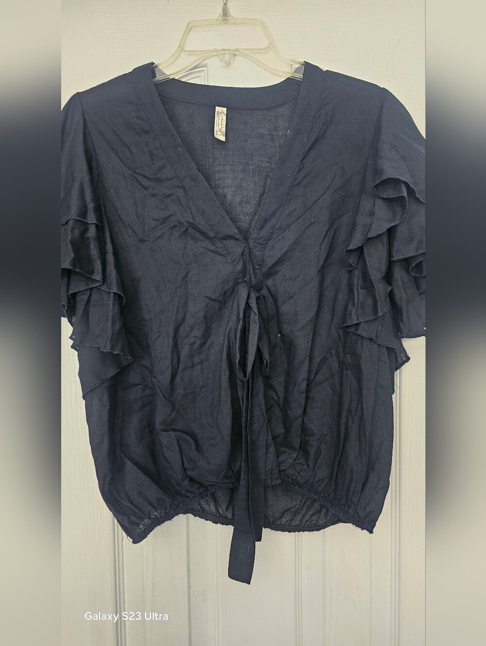 Free People top "Island Angel Flutter Top" features a distinctly bohemian Look - Picture 2 of 10